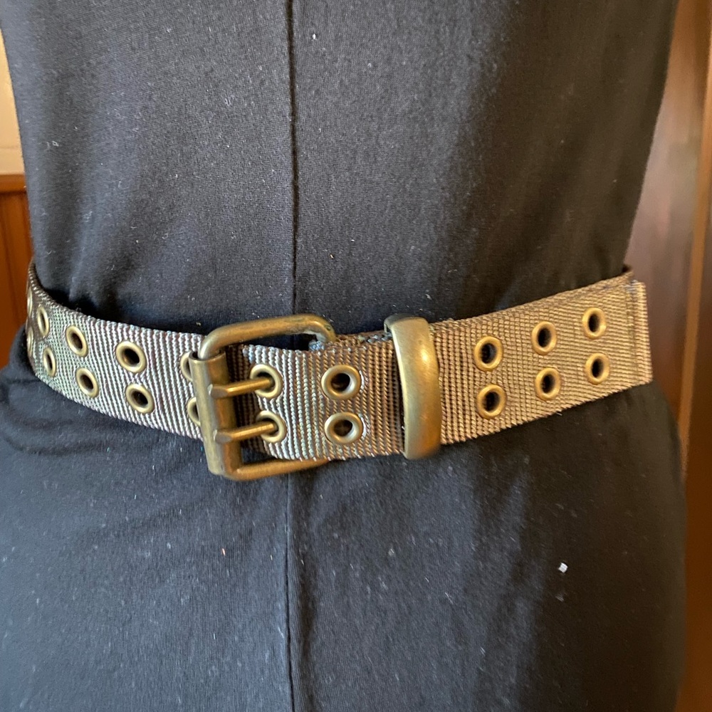 Nylon Web Belt with grommets .